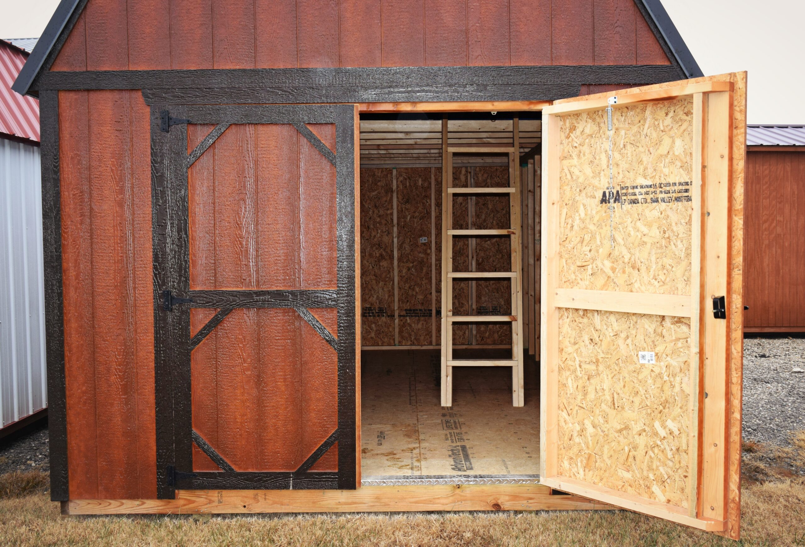 Opened door to urethane shed with black trim