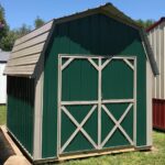 Green with tan trim economy shed